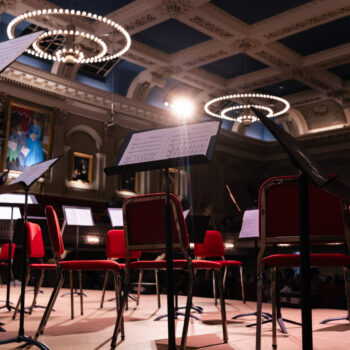 REFRACTIONS | WCMS S21 Stage Lights and Music Stands